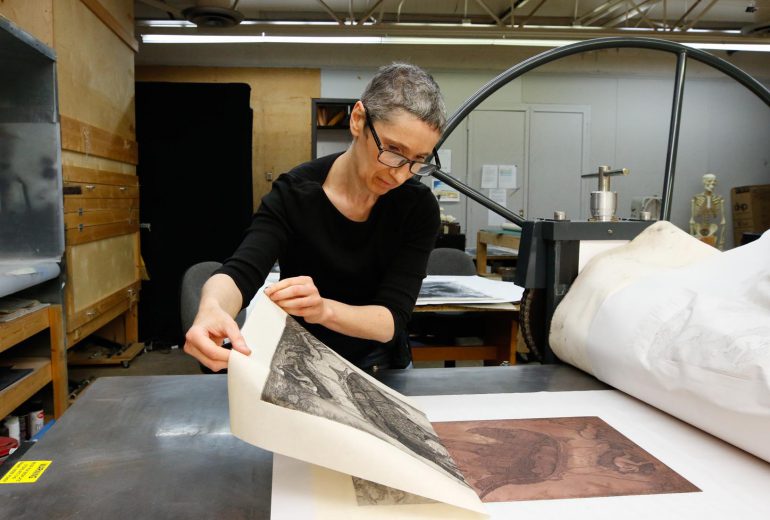 Professor Goro-Rapoport pulling print from a copper plate